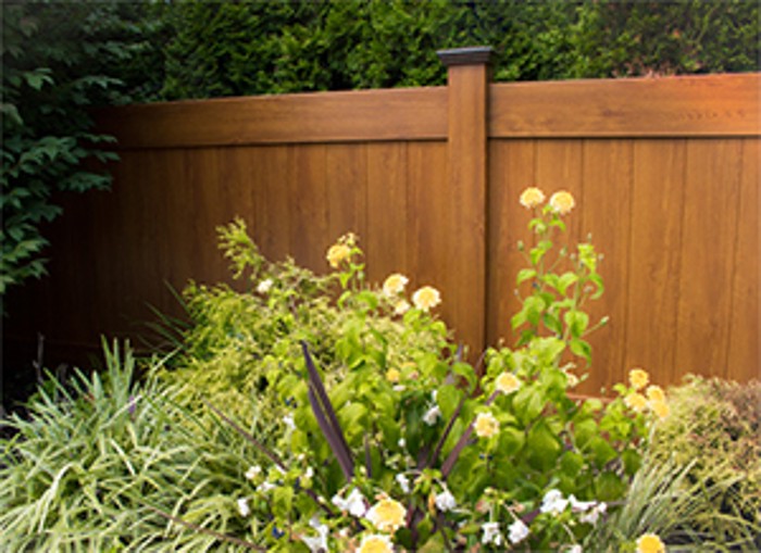 Pinnacle Golden Oak Privacy fence