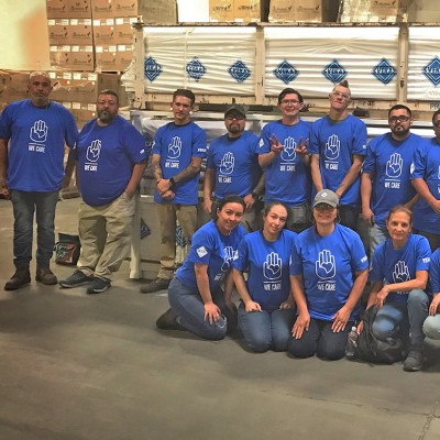VEKA West Employees wearing their We Care shirts