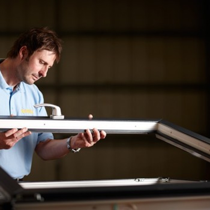 Employee with an Epwin window