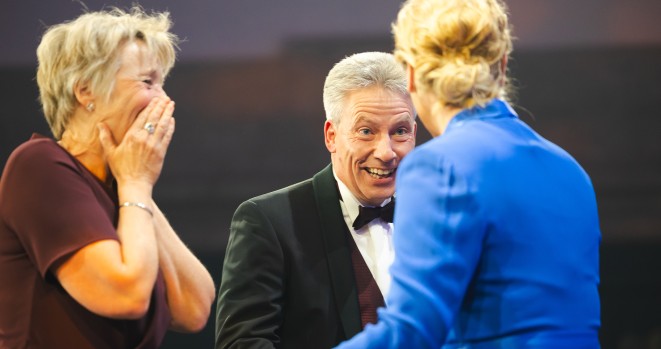 Elke and Andreas Hartleif happy on stage