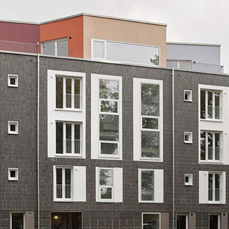 White plaster flaps as a frame for the windows