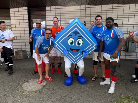Players from VEKA France with the VEKA mascot