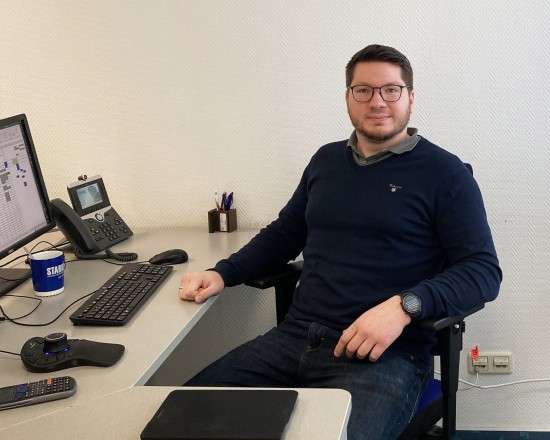 Schmelzer at his desk