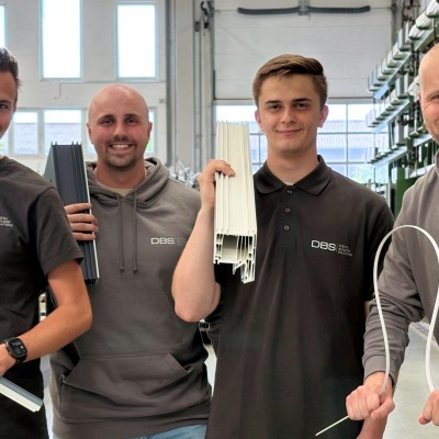 Four colleagues in the new DBS clothing
