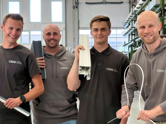 Four colleagues in the new DBS clothing