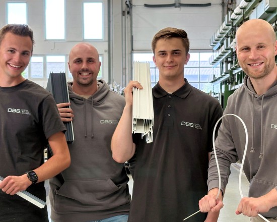 Four colleagues in the new DBS clothing